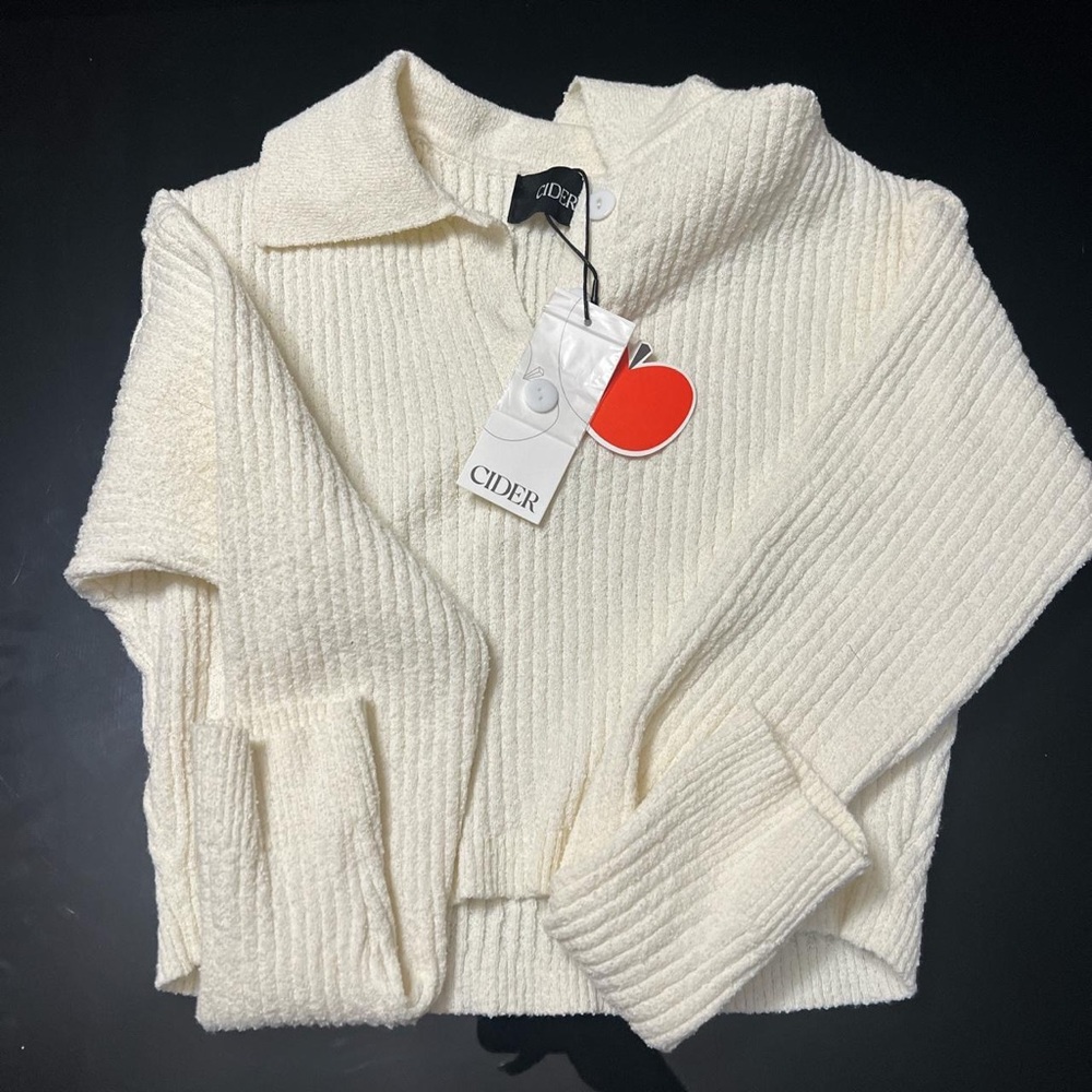 CIDER long sleeve next worn shirt with tags still intact.perfect for coldweather